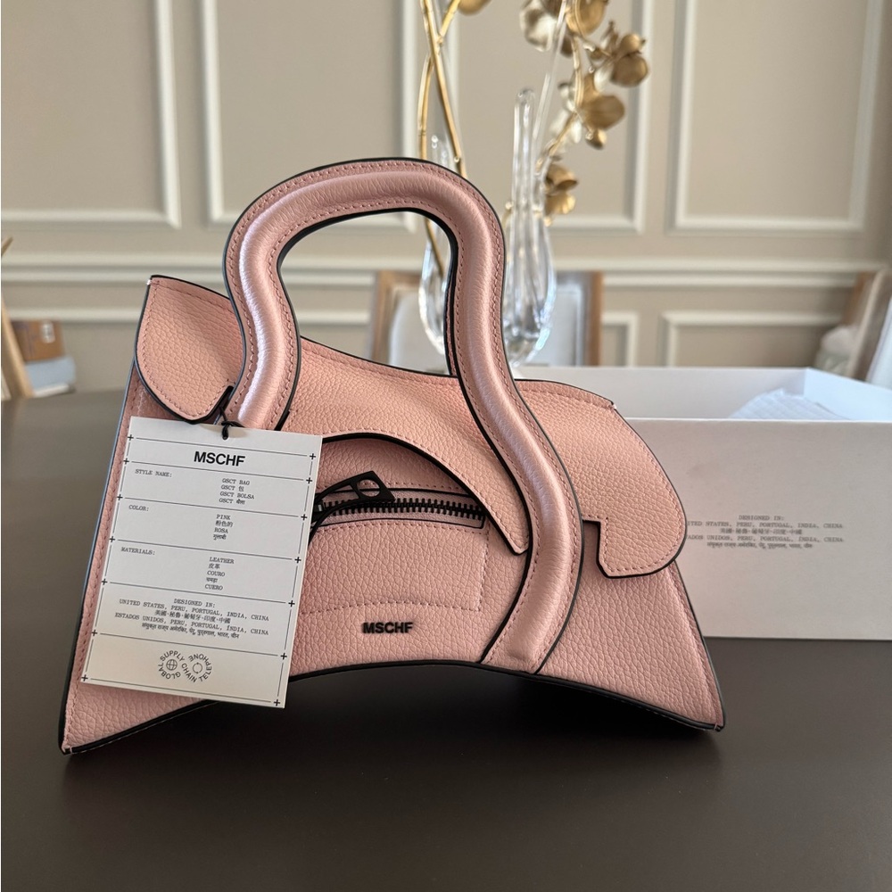 MSCHF 
Global Supply Chain Telephone Handbag - Pink